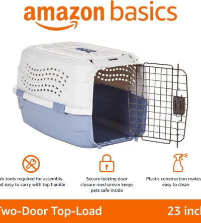 Cat sitting comfortably inside a pet travel carrier with mesh ventilation.