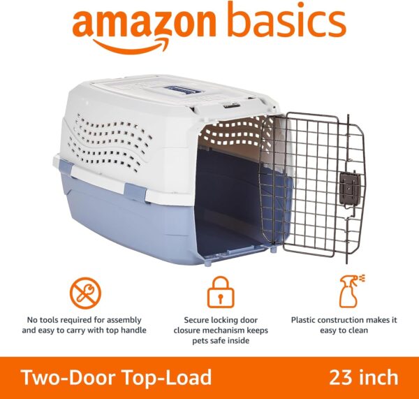 Cat sitting comfortably inside a pet travel carrier with mesh ventilation.