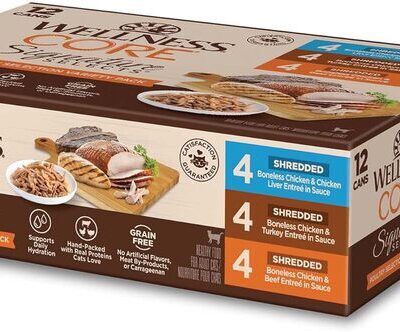 Wellness CORE Signature Selects Shredded Adult Wet Cat Food can with gourmet-style shredded meat in gravy, served in a small white dish.
